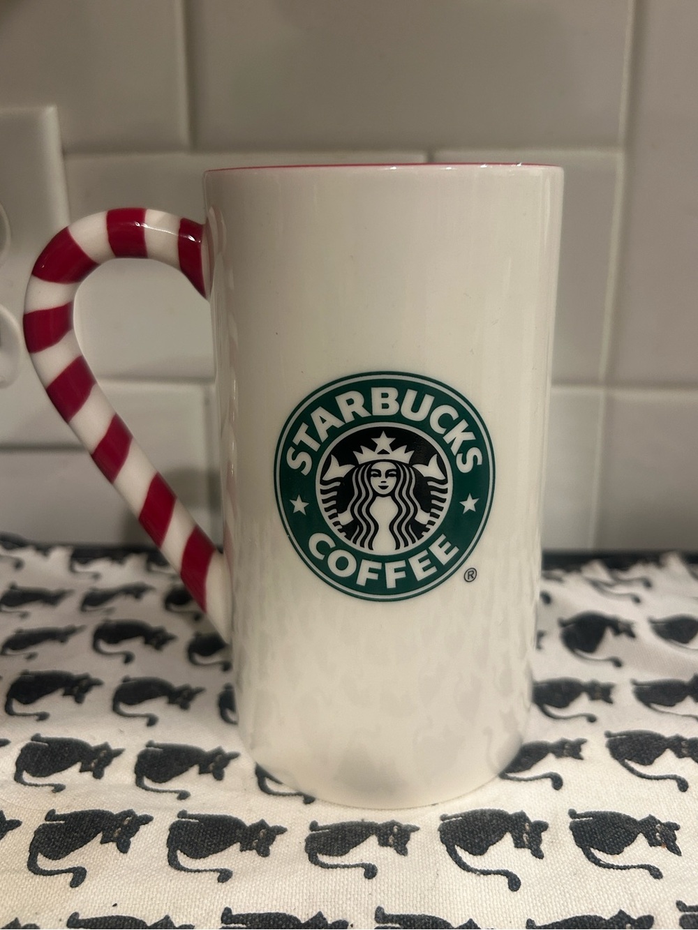 Starbucks 2009 Holiday Mug White Candy Cane Handle, Red Inside with snowflakes